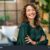 stock-photo-portrait-of-young-smiling-woman-looking-at-camera-with-crossed-arms-happy-girl-standing-in-1865153395